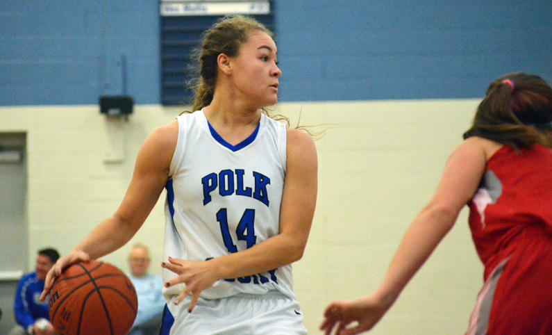 Polk County's Lyric Flood looks for a teammate during Friday's win.