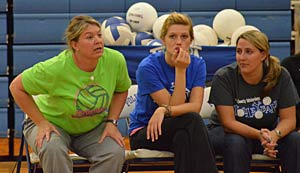 Polk County volleyball coach Kelly Risley, left, is stepping down after one season with the program.