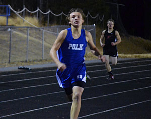 Nate Smart heads for the finish line Wednesday during the 300-meter run.