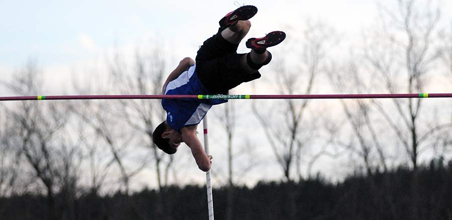 Polk County's Troy Lieberman soars in the pole vault.