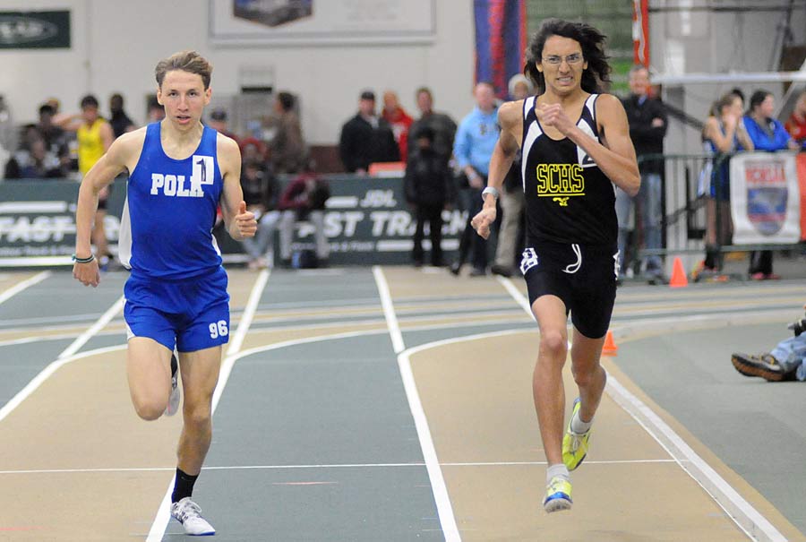 Polk County's Sean Doyle and Surry Central's Surry Central's Daniel Alvarez-Orlachia race to the finish line in the 1000-meter run.