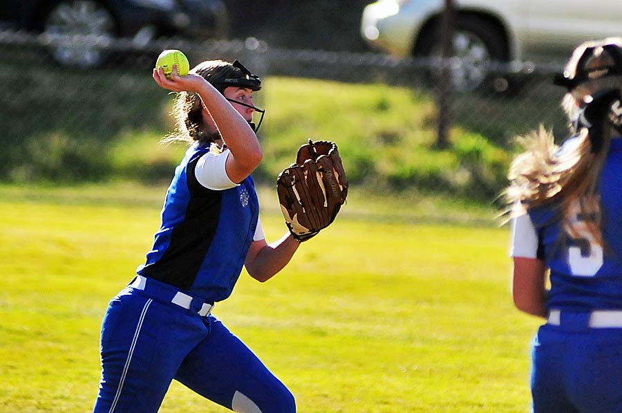 Polk second baseman Maranda Gosnell throws out a runner at first late in Tuesday's game.