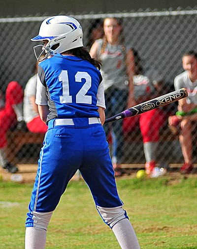 Polk County's Alice Combernoux awaits a Hendersonville pitch.