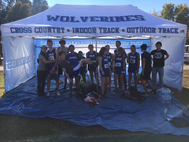 Polk County's cross country team members show off the program's new tent (photo courtesy Alan Peoples).