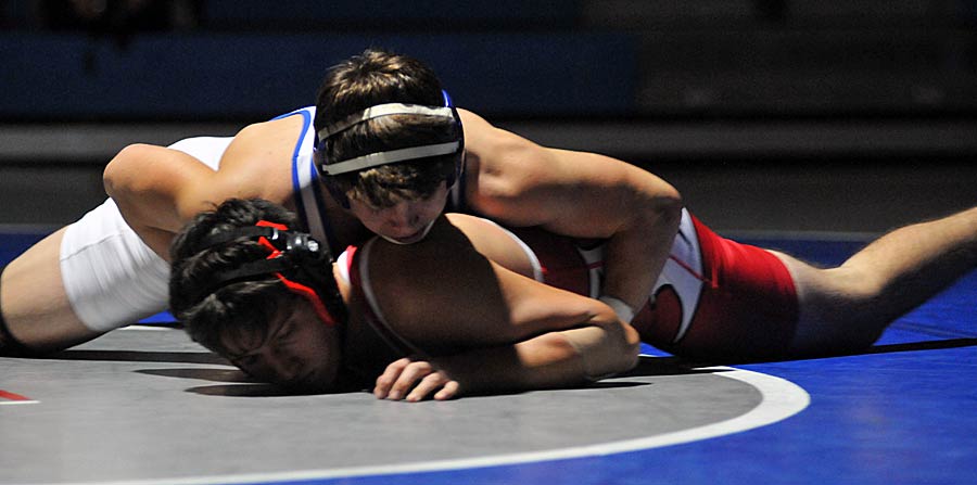 Polk County's Dillon Knighton controlled his 152-pound match before recording a fall late in the first period.