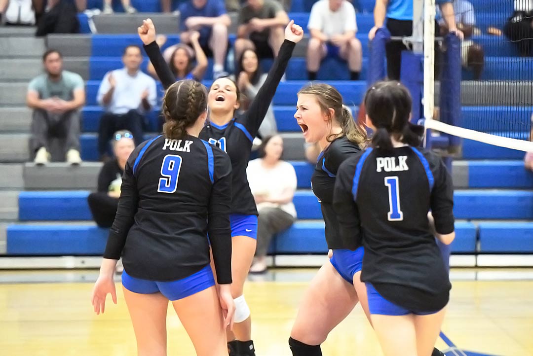 Sofie Abrahamsen and Polk County teammates celebrate a point