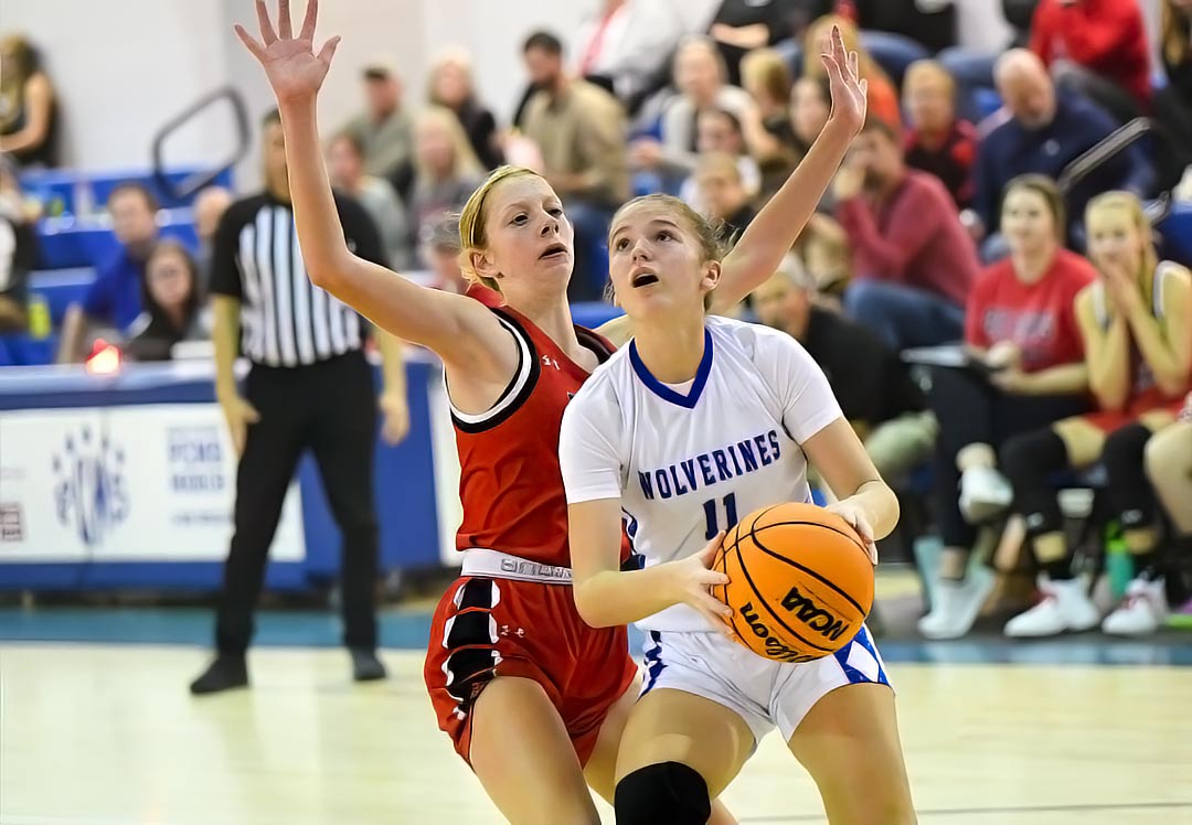 Polk Middle's Ryleigh Dill drives to the basket during the first half of Thursday's game