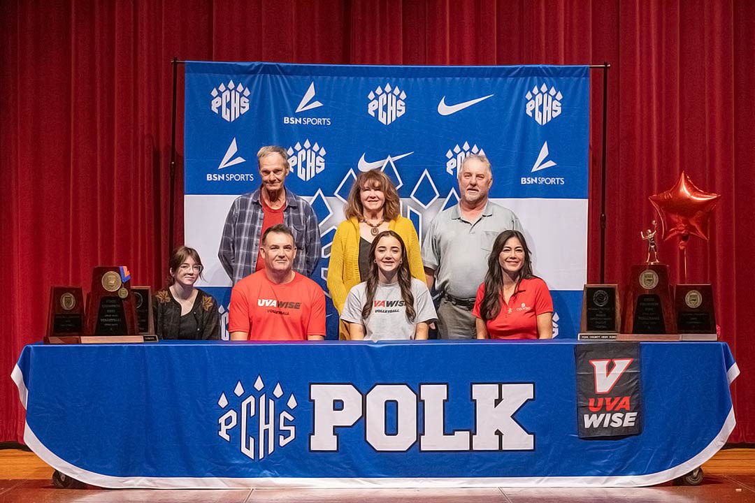 Mia Bradley, front center, and family celebrated Thursday her signing with University of Virginia's College at Wise