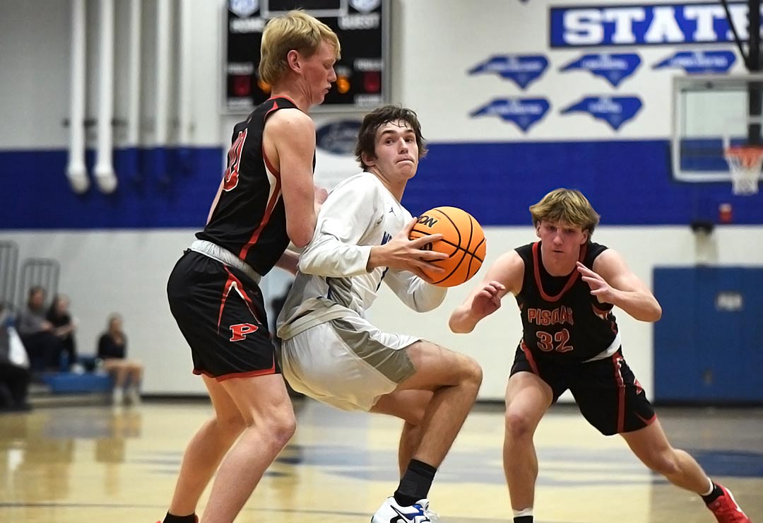 Aaron Jackson spins to the basket to attempt a short jumper during the second half of Tuesday's game