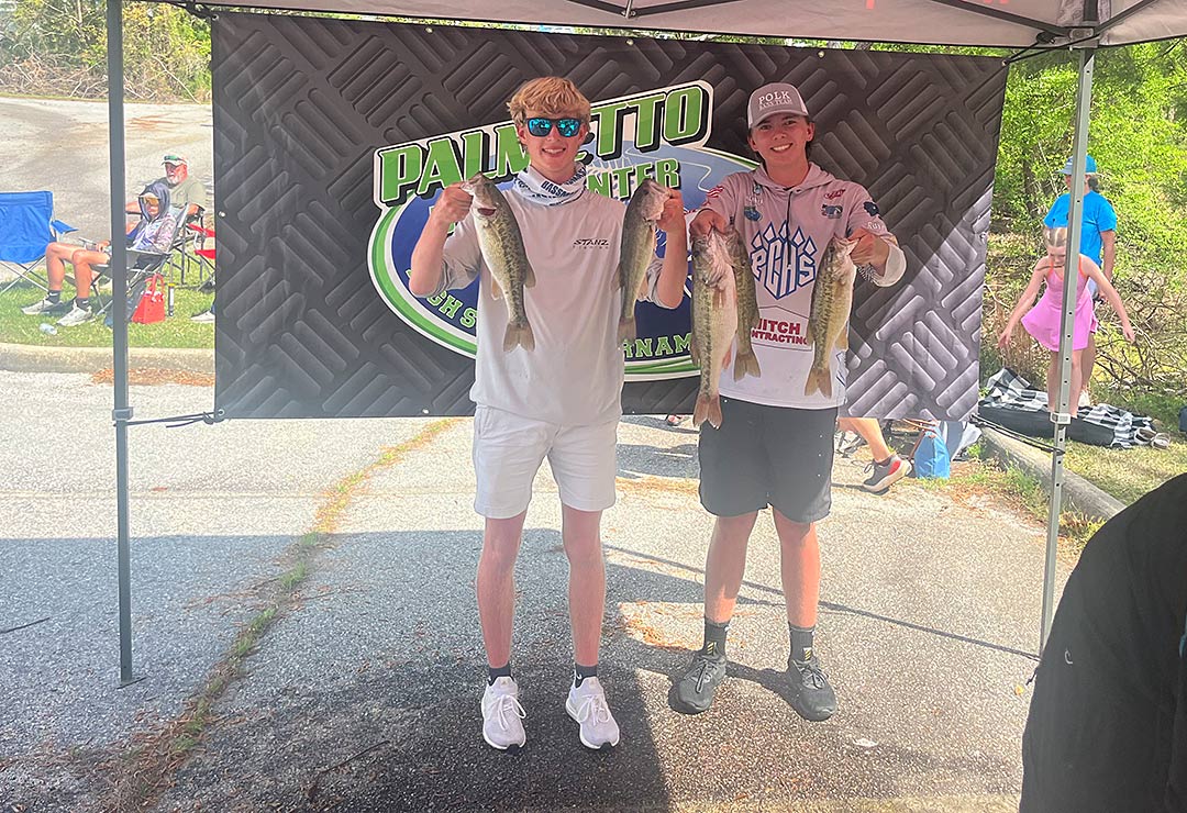 Polk County Bass Fishing Team members Wyatt Highsmith, left, and Konnor Huskey show off their catch at Clarks Hill Lake (photo courtesy Chauncey Barber)