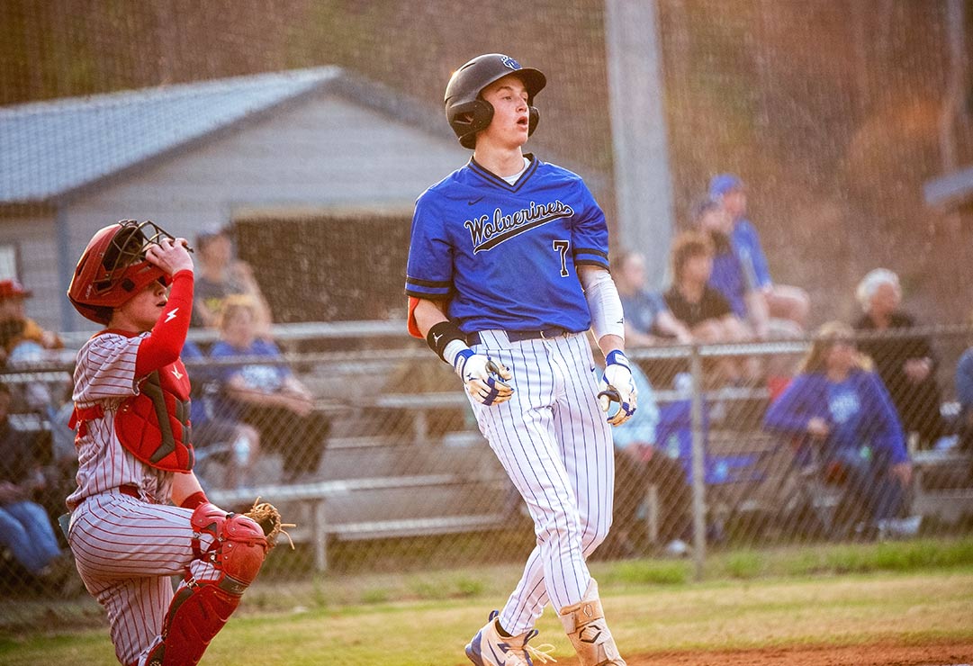 Polk County junior Gunnar Alm watches his fourth home run of the season in a recent game against Hendersonville