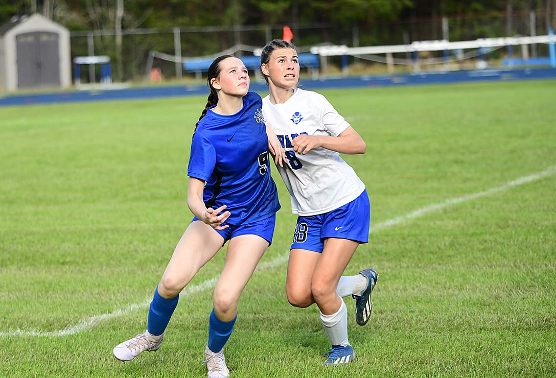 Polk County defender Jill Brown battles with Brevard's Charley Goodwin earlier this season