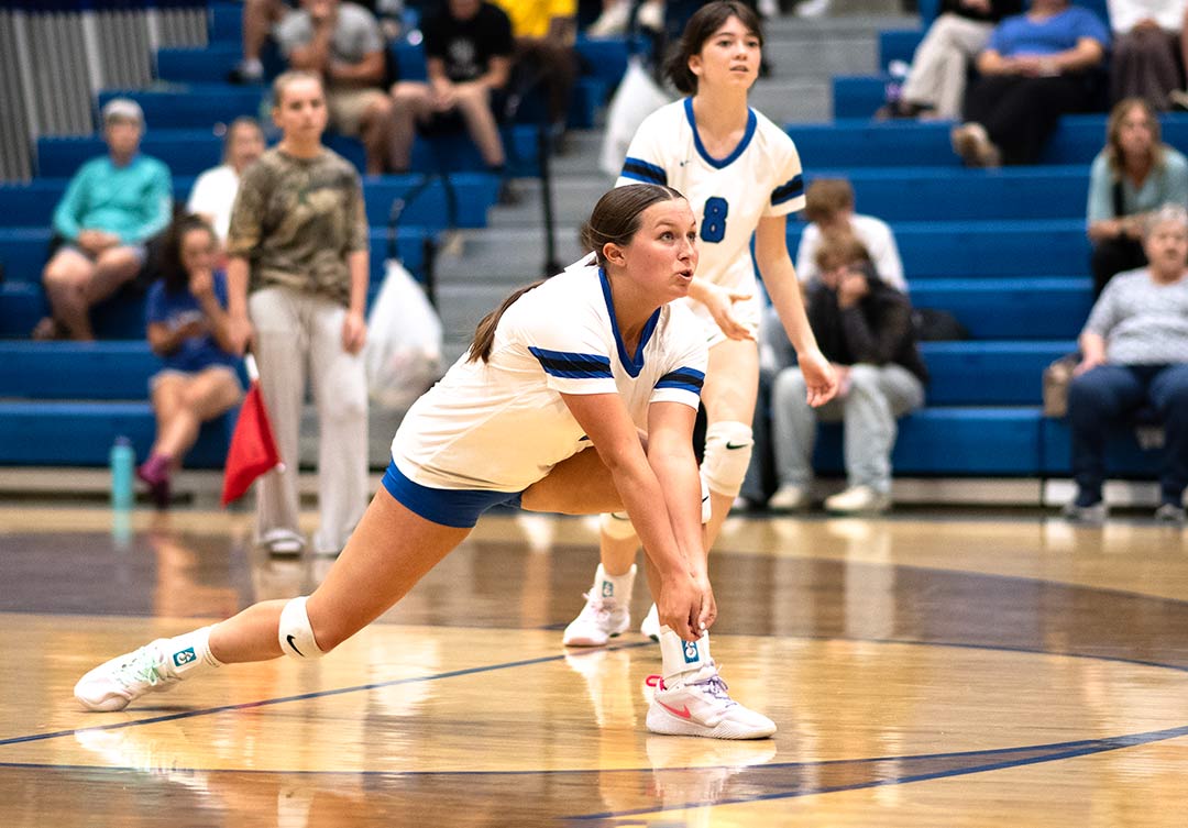 Polk County's Junie Mitchell focuses on an incoming shot during a recent match