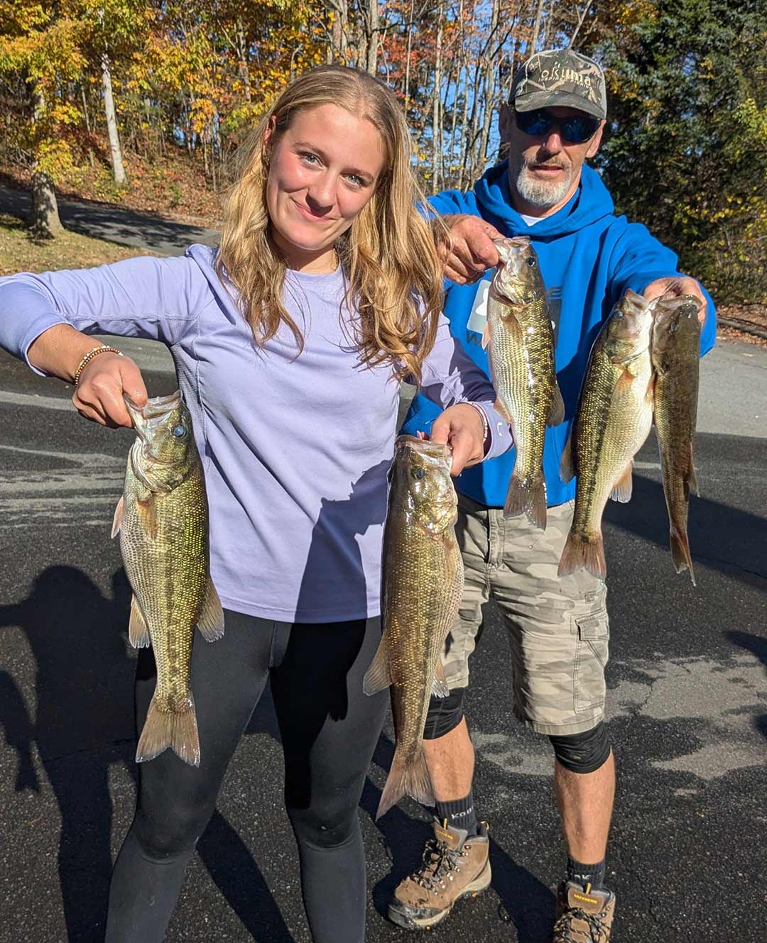 Minda McComas, left, and her father Rob McComas display Minda's catch during the Nov. 1 tournament at Fontana Lake (photo courtesy Chauncey Barber)