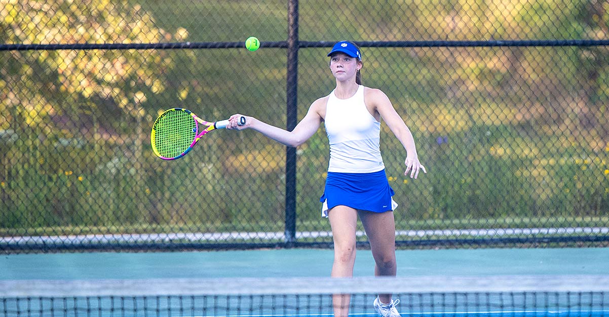 Polk County's Jill Brown returns a shot during a match in the 2025 season