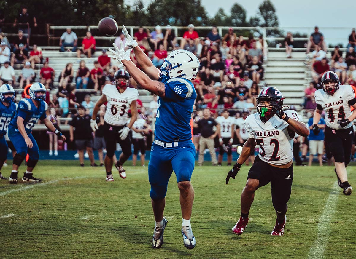 Polk County's Sawyer Huff prepares to haul in a pass during the first half of Friday's game (Caleb Russell photo)