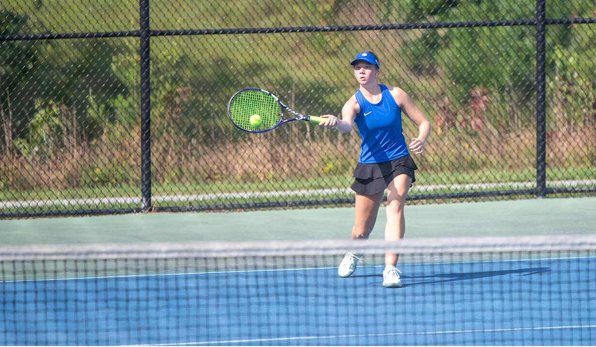 Polk County's Jill Brown won four singles and doubles matches on Thursday