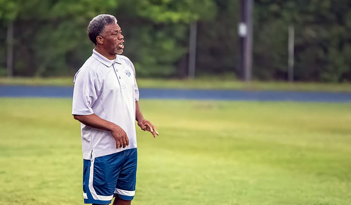 Lennox Charles will take the field for the 1,000th time as a Polk County head coach on Wednesday